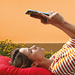 Woman reading from tablet