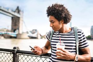 Man on phone tower bridge London