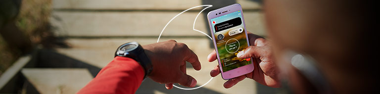 Man eating nuts in a pub