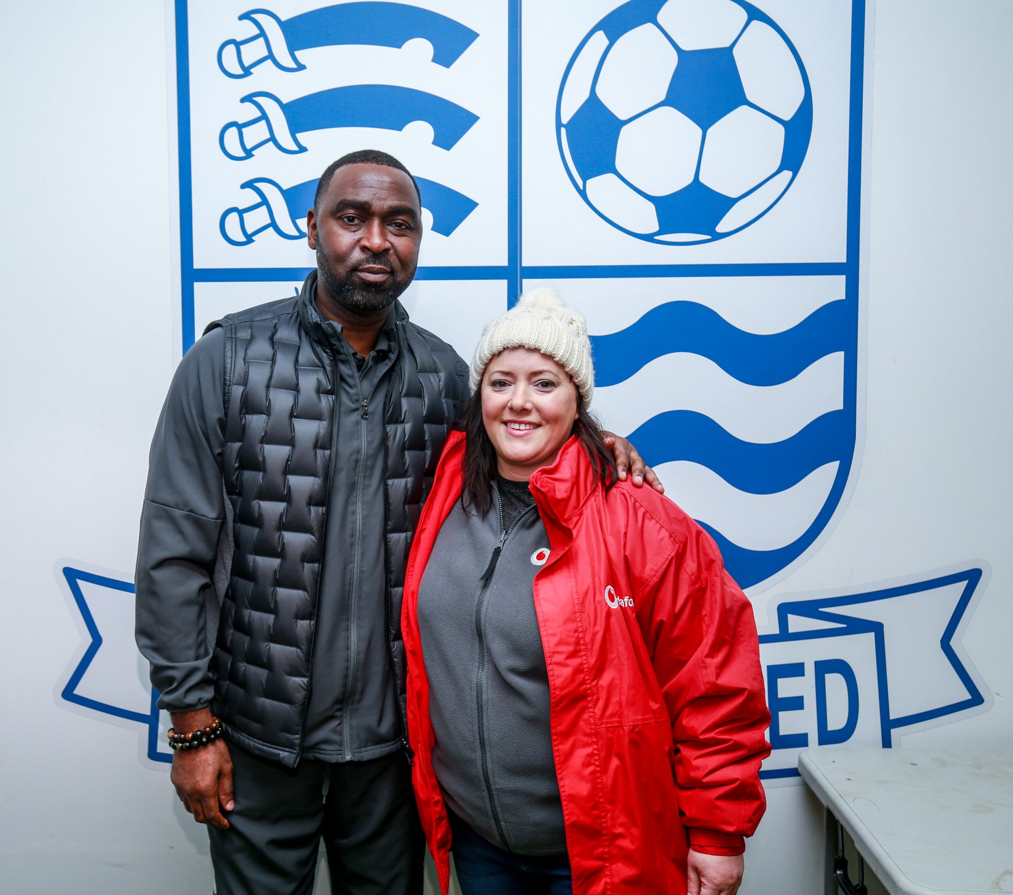 photo of Andrew Cole, Forward and Attack Coach for Southend United F.C., and Fiona McMahon, Vodafone’s Southend-on-Sea City Manager