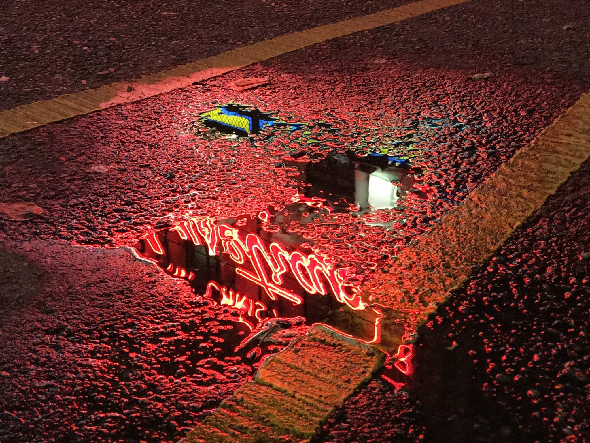 a shot of reflections in a street puddle