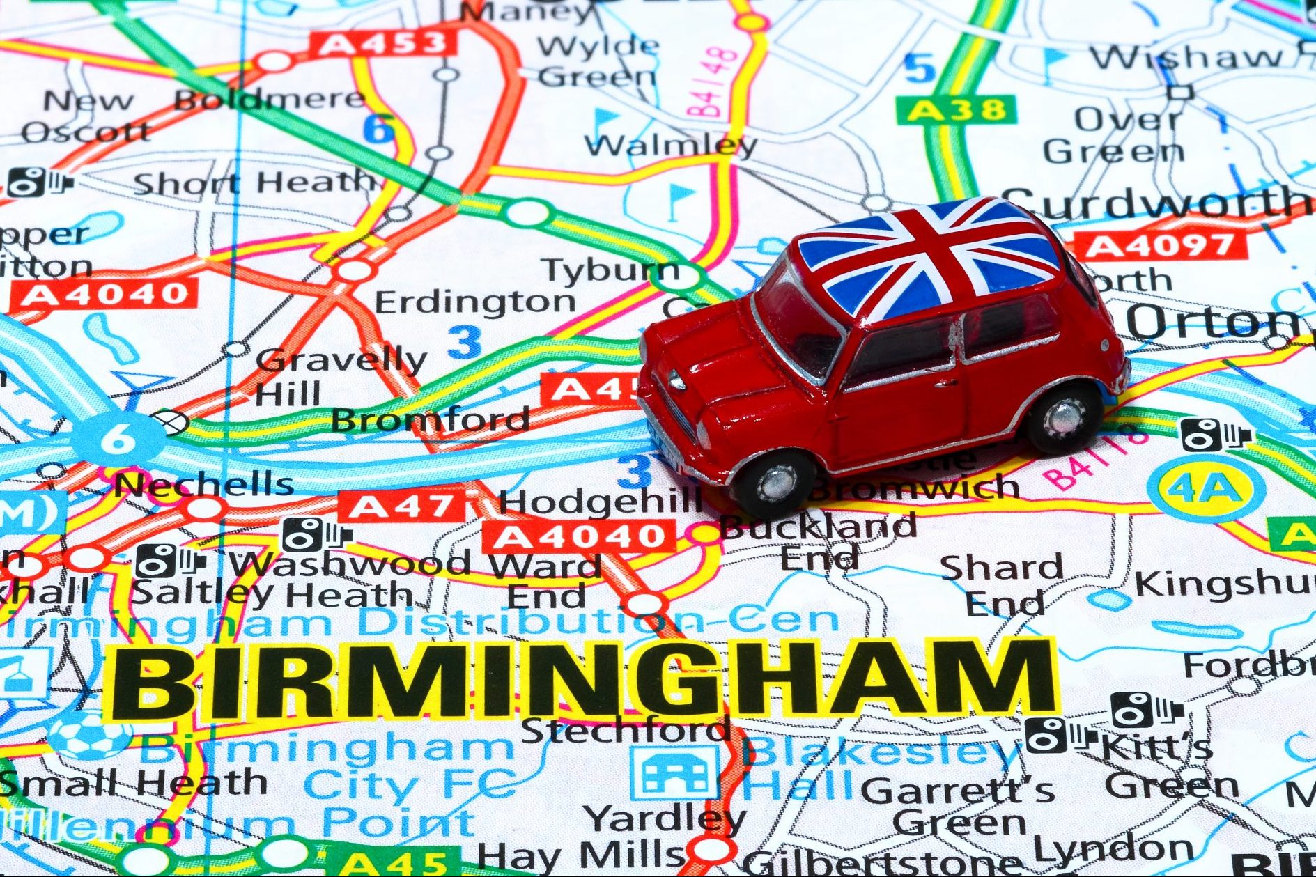 British toy Mini on map of Midlands