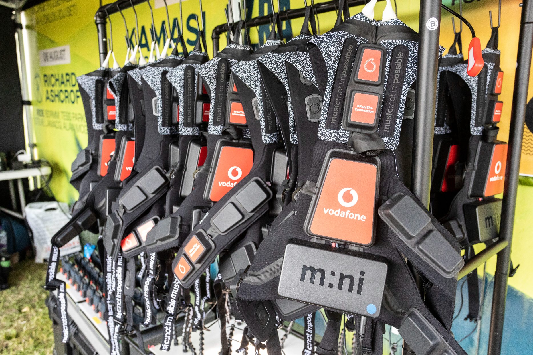 Vodafone 5G haptic suits on a rack at Mighty Hoopla