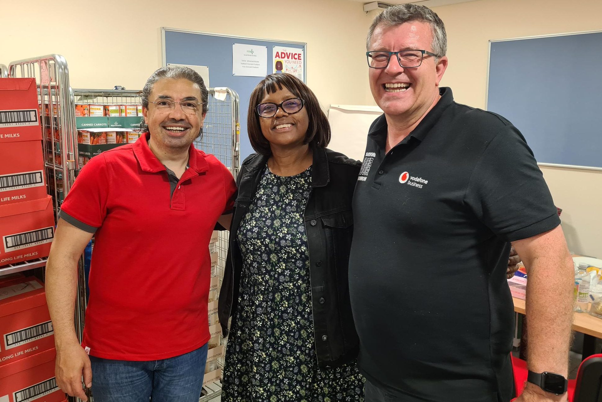 (From left to right) Ahmed Essam, Vodafone's UK CEO; Kathy Byfield, Greenwich Foodbank Operations Manager; Nick Gliddon, Vodafone's UK Business Director