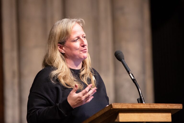Trussell Trust CEO Emma Revie speaking at the charity's Winter Carol Concert in Southwark Cathedral, London