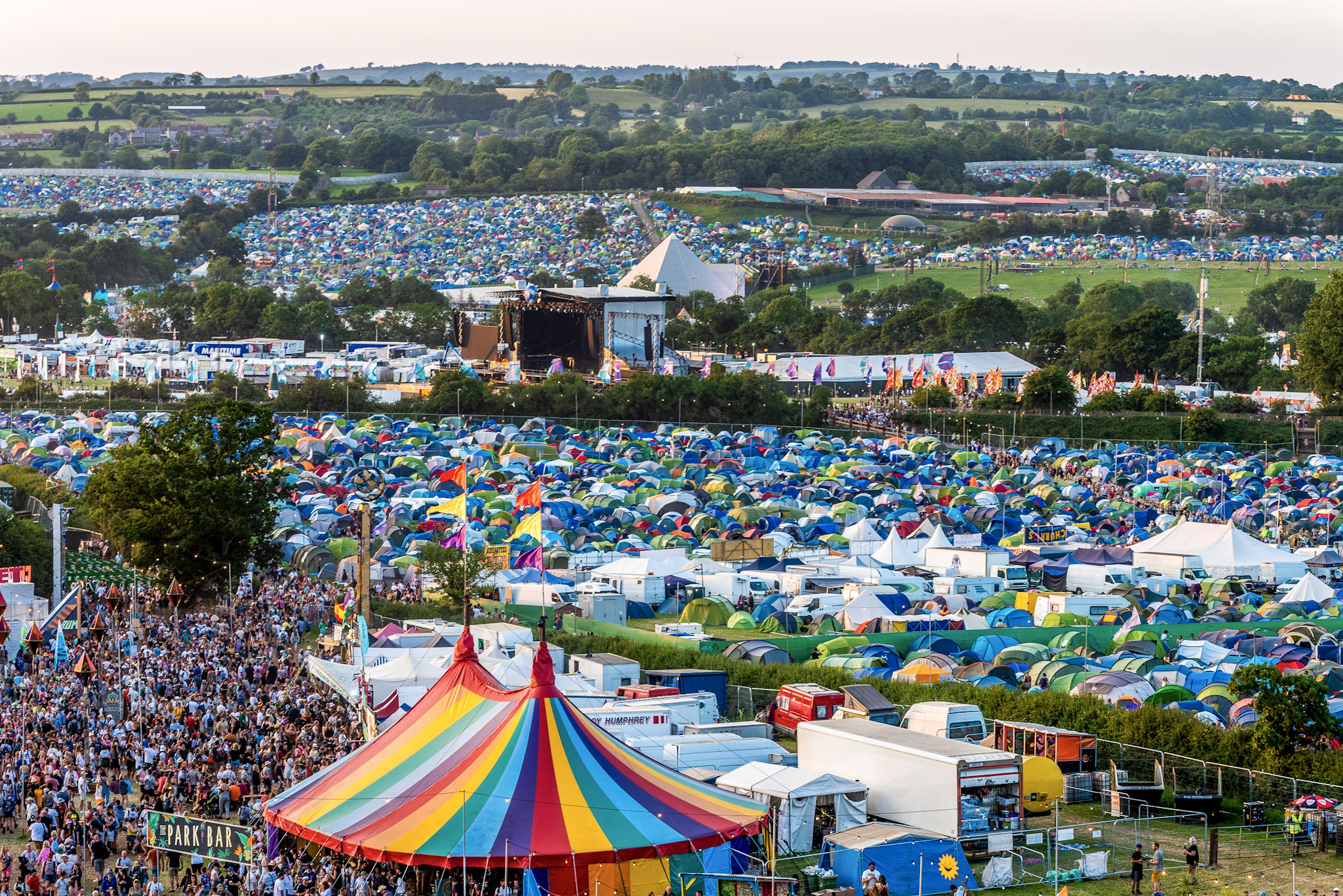 landscape photo showing tents at Glastonbury Festival dated June 2022