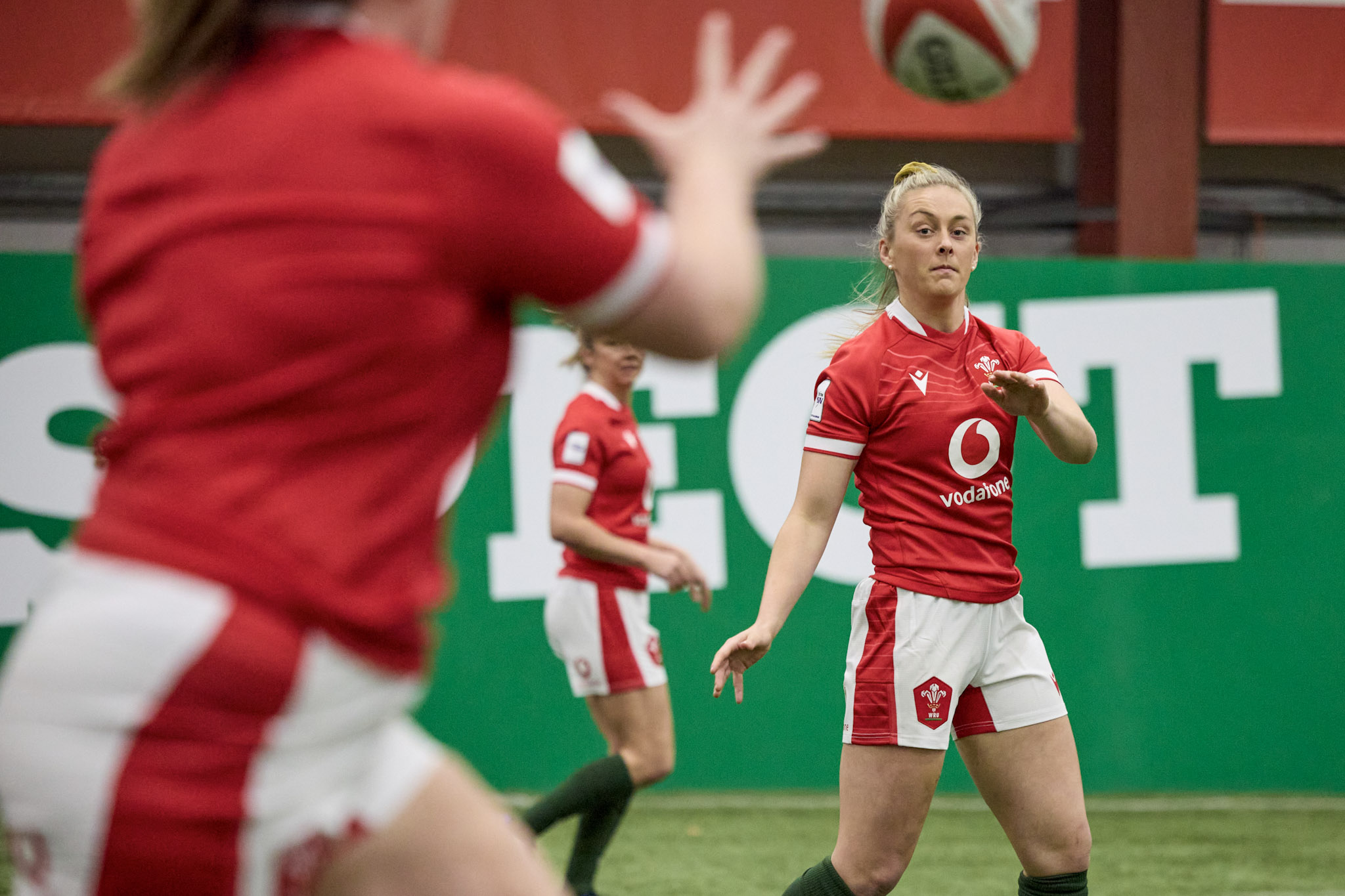 photo of Wales Women rugby players practicing on a pitch