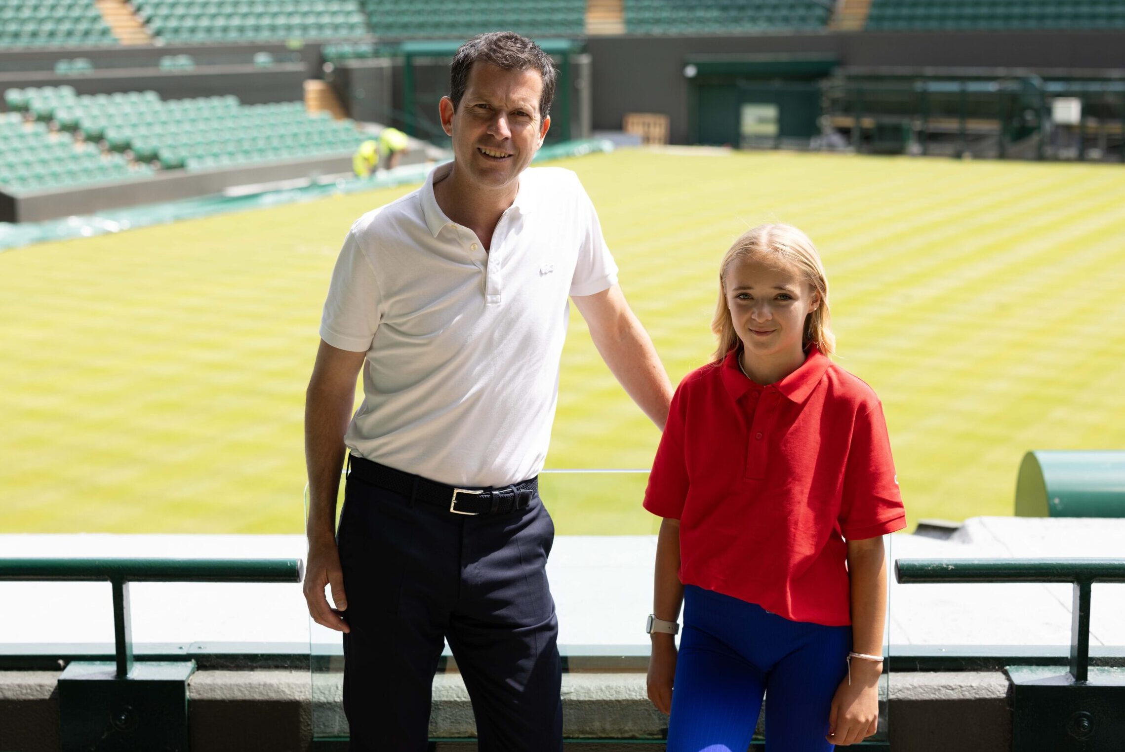 Tim Henman (Left) and junior tennis player, Frankie at Wimbledon