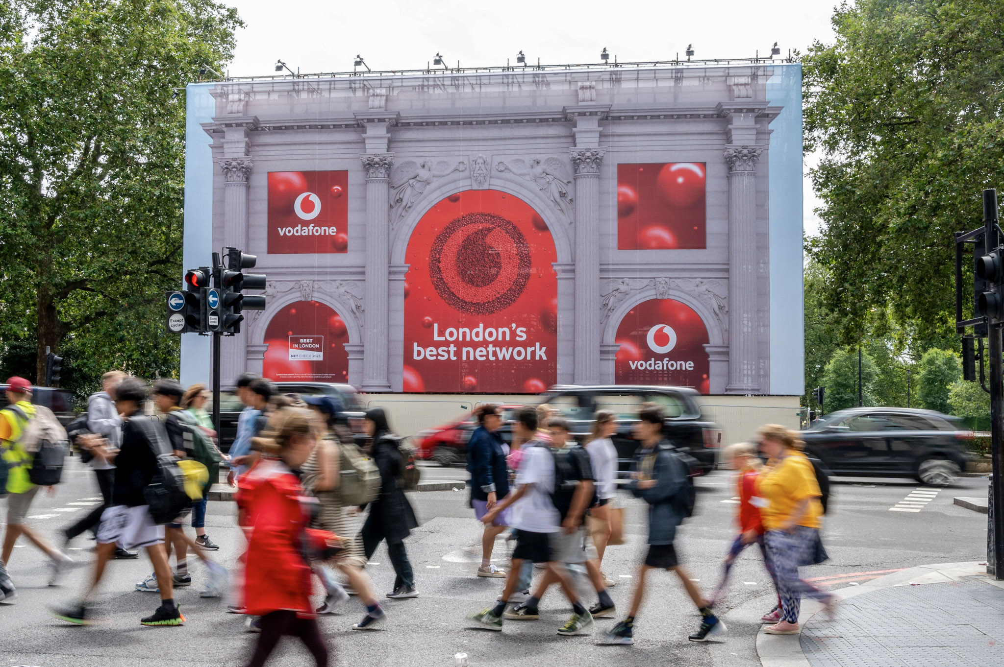 photo of advertising wrapped around Marble Arch while it undergoes conservation