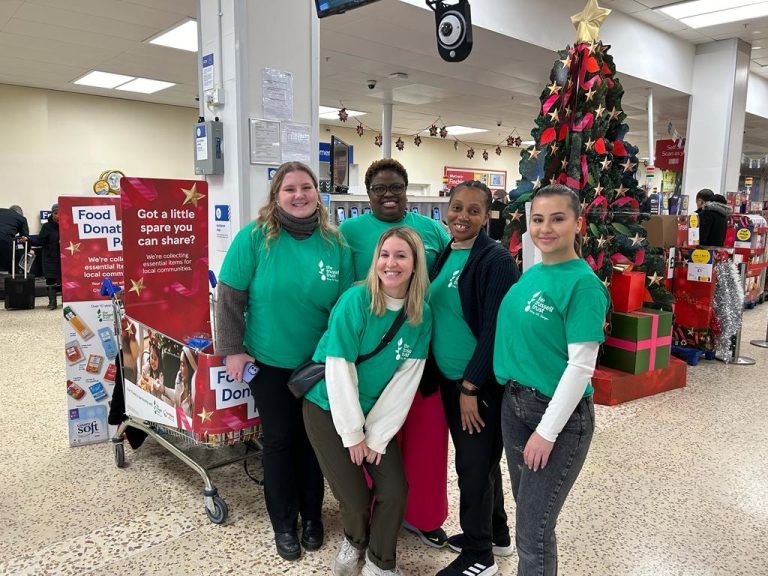 photo showing Vodafone staffers volunteering for The Trussell Trust at a London Finchley branch of Tesco.