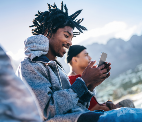 Young man using his phone