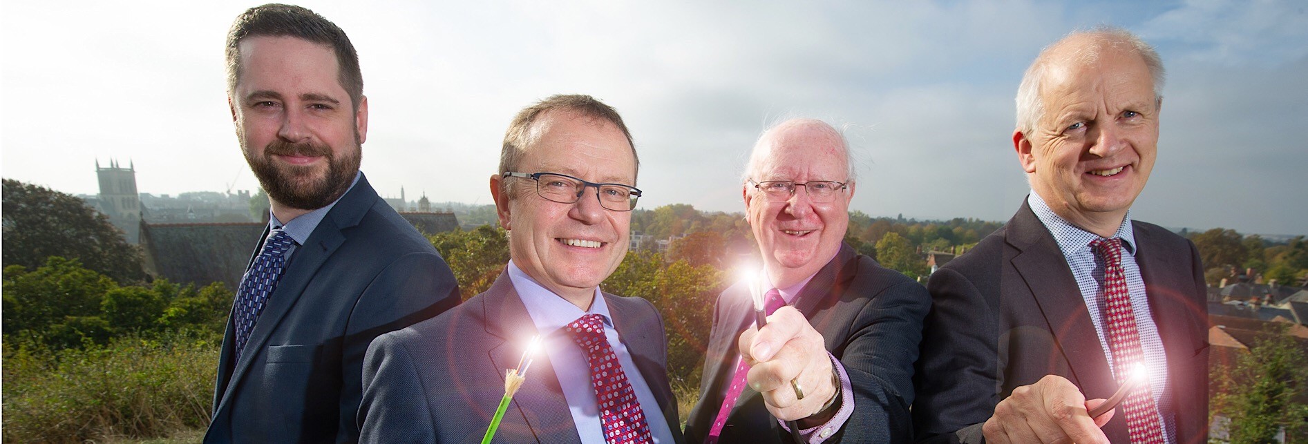 Vodafone's Paul Ryder and CityFibre's Andy Starnes alongside Cambridge Councillors Ian Bates and Lewis Herbert