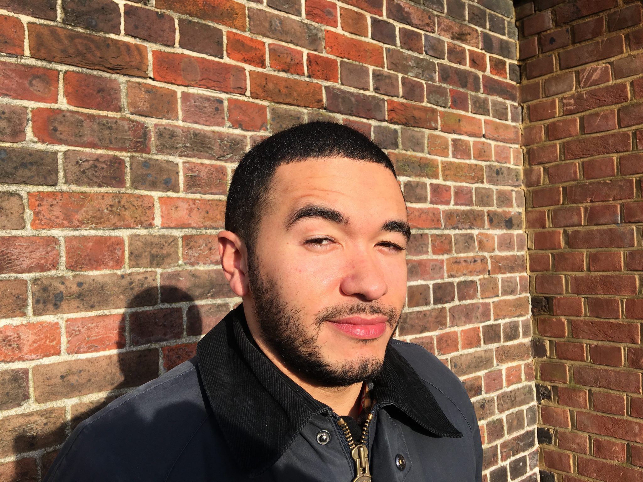 shot of a man photographed with the light source behind the photographer