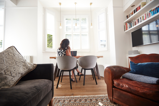 Woman at desk working from home
