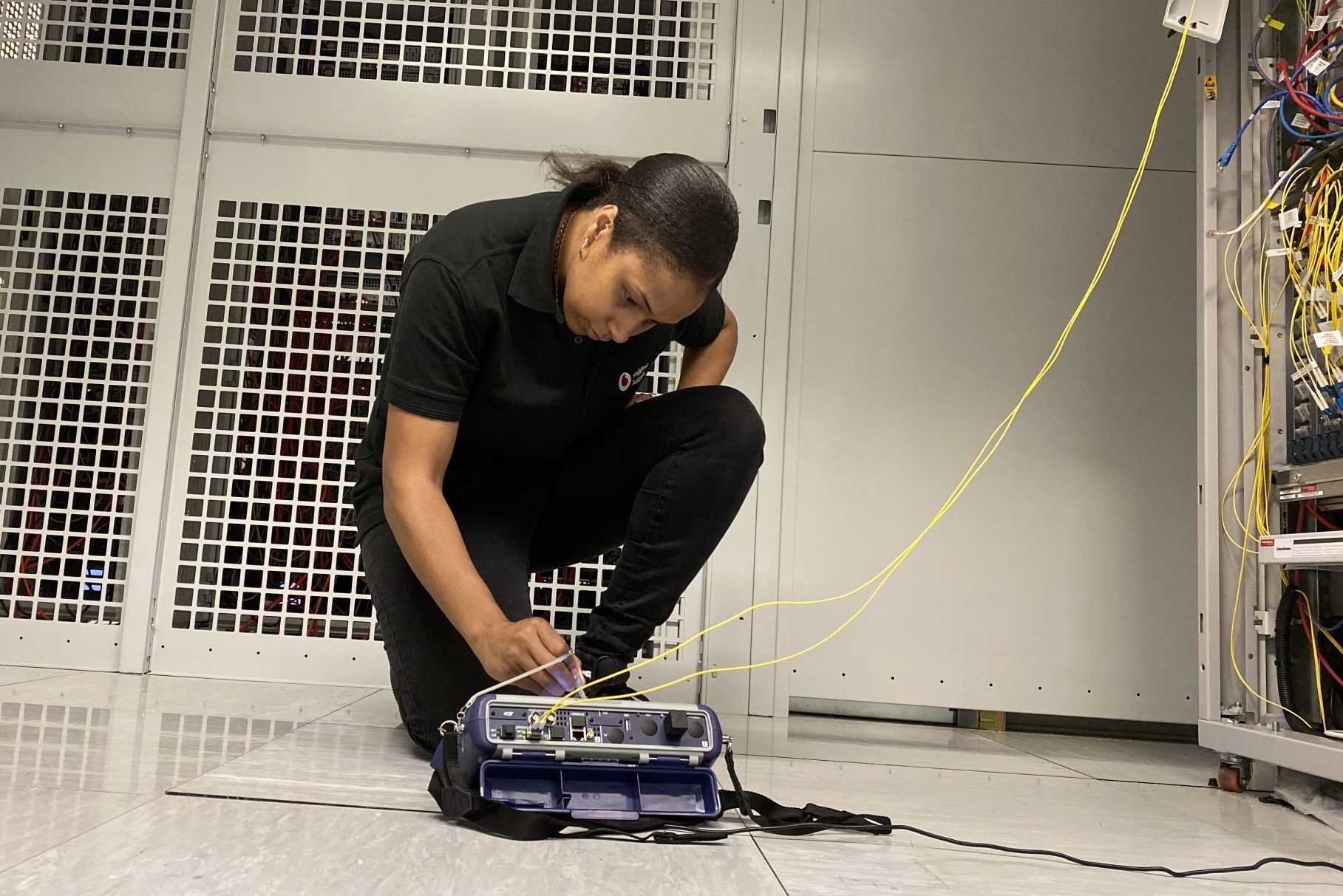 Natasha Carpenter testing equipment for banking customer