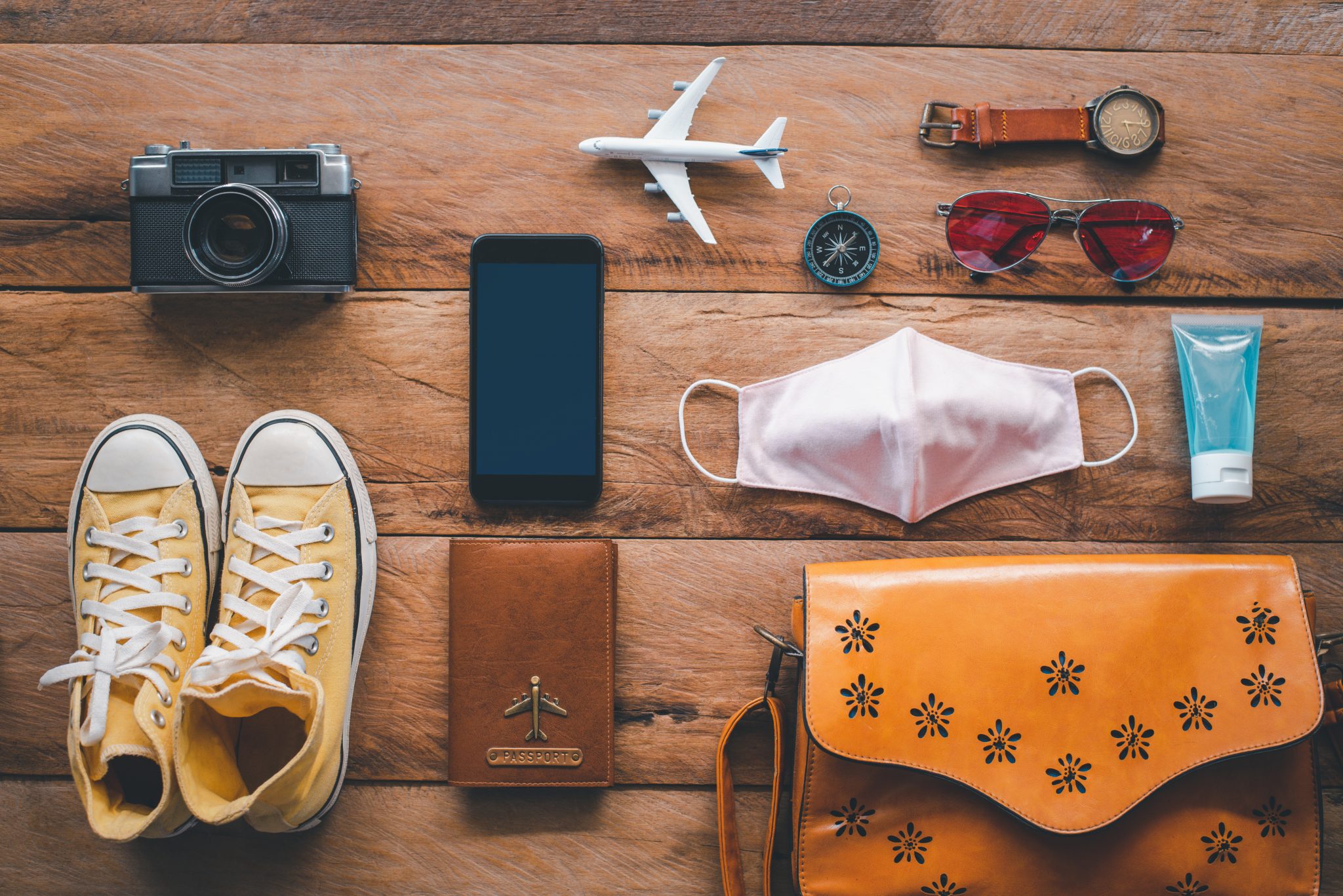 Holiday essentials laid out on wooden floor