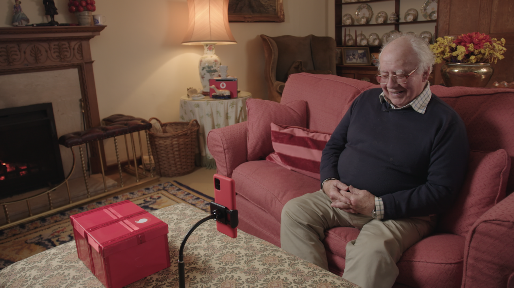 photo of Olympic gold medallist Tony Nash with a Vodafone 5G-connected smartphone