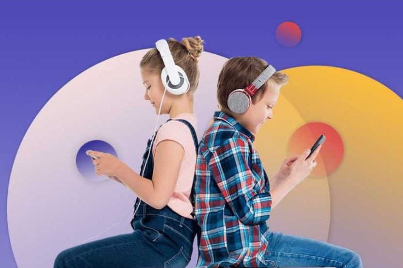 Screentimelabs Two kids back-to-back with headphones on looking at smartphones