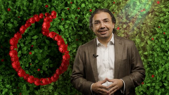 Image of Ahmed, CEO, Vodafone UK in front of a green wall with Vodafone speechmark.