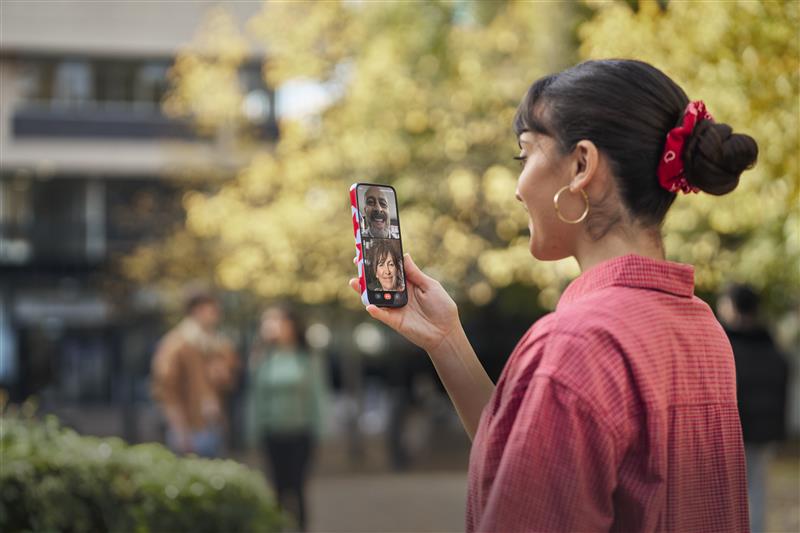 Woman video calling on phone.