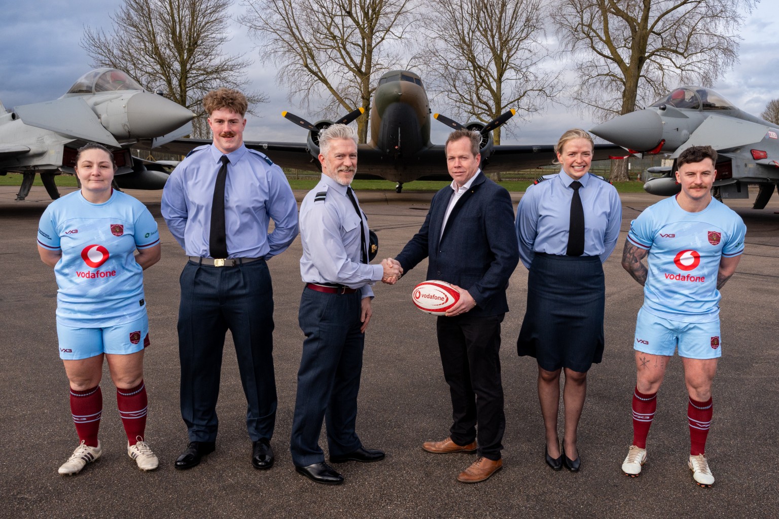 Steve Knibbs, Director, Vodafone Business Security Enhanced, with members of the Royal Air Force Rugby Union.