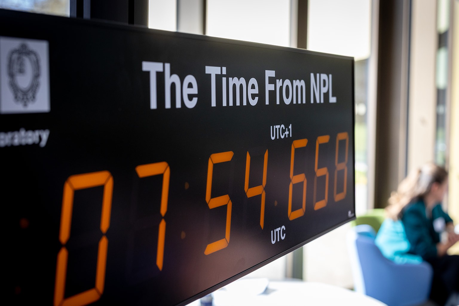 Digital clock showing NPL Time.