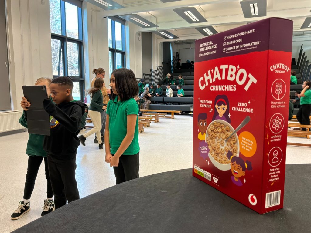 VodafoneThree AI chatbot cereal box at UK school.