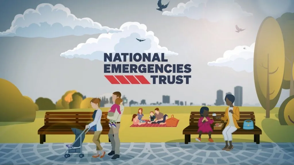 NET image Cartoon illustration of people in a park with the text 'NATIONAL EMERGENCIES TRUST'. A woman pushes a stroller, a man carries a child, a family picnics, and a woman and girl sit on a bench. City skyline and trees are in the background.