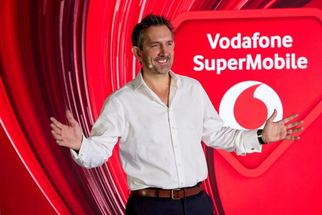 Max Taylor on stage at the Vodafone SuperMobile launch event.