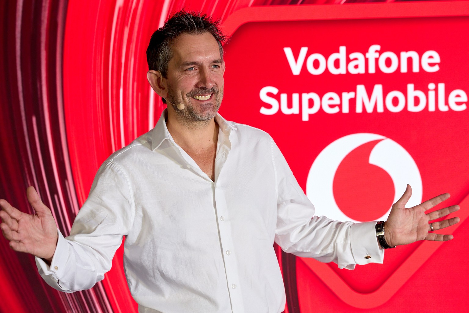 Max Taylor, VodafoneThree CEO, on stage at the launch event of Vodafone SuperMobile.